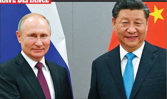  ?? ?? IN A DIFFERENT LEAGUE: Vladimir Putin and China’s Xi Jinping, who heads a regime far more brutal than Moscow’s, at the Beijing Winter Olympics