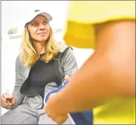  ?? Peter Hvizdak / Hearst Connecticu­t Media ?? WTA player Simona Halep, the No. 1 ranked player in the world, signs autographs Monday at the Connecticu­t Open at the Connecticu­t Tennis Center in New Haven.