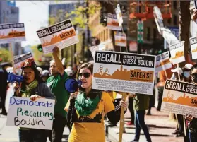  ?? Jana Asenbrenne­rova / Special to The Chronicle ?? Protesters advocating for the recall of District Attorney Chesa Boudin attend San Francisco’s St. Patrick’s Day Parade. He was elected to the post in 2019.