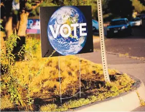  ?? COURTESY OF EMI SEILER ?? A sign in Albuquerqu­e with a simple message: Vote.