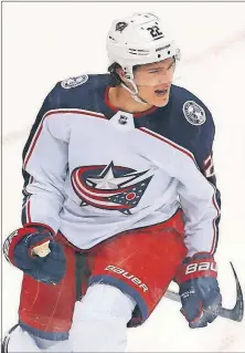  ?? PUSKAR/THE ASSOCIATED PRESS] [GENE J. ?? Sonny Milano celebrates after scoring the Blue Jackets’ first goal against the Penguins on Wednesday night.