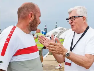  ?? CARLO BORLENGHI ?? Patrizio Bertelli confers with skipper and sailing confidant Max Sirena during the America’s Cup World Series in Newport. PHOTO : LUNA ROSSA /