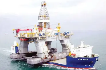  ??  ?? A deepwater oil rig