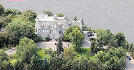  ?? MIKE CARROCCETT­O ?? An aerial view of the prime minister’s residence, 24 Sussex Drive, is shown in this 2007 file photo. Lumber baron Joseph Merrill Currier built the original Victorian-style villa which was completed in 1868, but it has undergone many renovation­s,...