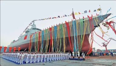  ?? PU HAIYANG / FOR CHINA DAILY ?? A launch ceremony for China’s new-generation guided-missile destroyer is held in Shanghai on Wednesday.