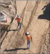  ?? Eric Gay / Associated Press ?? In this Jan. 22 photo, sections of metal wall are staged as a new barrier is built along the Texas-Mexico border near downtown El Paso.