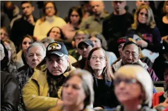  ?? Robert F. Bukaty/Associated Press ?? New Hampshire voters attend an event Saturday in Nashua, N.H. The state is hosting its first-in-the-nation Republican primary on Tuesday. Former President Donald Trump is vulnerable in New Hampshire largely because of its moderate tradition.