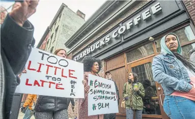  ?? MICHAEL BRYANT/THE ASSOCIATED PRESS ?? Starbucks’ self-congratula­tory reaction to its fiasco is typical of its desire for social approval, Rick Salutin writes.