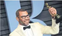  ??  ?? Jordan Peele, winner of Best Original Screenplay, was mobbed when he arrived at the Vanity Fair party, writes Shinan Govani.