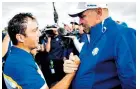  ??  ?? Winners: Francesco Molinari with Thomas Bjorn, the Europe captain