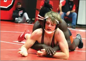  ?? Alex Eller ?? Layton Lindner of Broken Bow wrestling during his second round match vs Dawson Mollendor of Chase County at 160. Linder ended up losing the match 8-1, but rebounded to get fourth overall for the Indians.