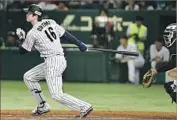  ?? Toru Takahashi Associated Press ?? SHOHEI OHTANI could be a big hit at the plate as well as in the Angels’ starting pitching rotation.