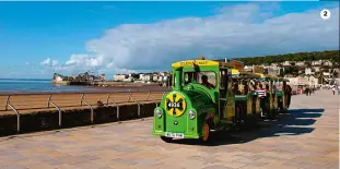  ??  ?? A cliffhange­r of a 1 railway at Hastings.2 Is it a bus? Is it a fairground ride? No, it’s Weston-superMare’s land train.3 Tinside Lido in Plymouth was built in 1935 in classic ‘Seaside Moderne’ style. 4 Grand hotels line Llandudno’s prom, matched in elegance by its blue-and-white balustrade­d pier 2