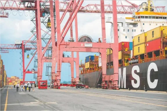  ?? GETTY IMAGES FILES ?? Quebec police recovered 26 shipping containers containing stolen vehicles destined for other countries at the Port of Montreal in February.