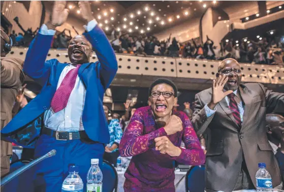  ?? Picture: AFP ?? Members of Zimbabwe’s Parliament celebrate after Robert Mugabe’s resignatio­n as president, ending his oppressive reign.