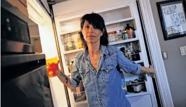  ?? Sonja Och / The Chronicle ?? Atelier Crenn’s Dominque Crenn stocks her refrigerat­or with the makings of her style of comfort food.
