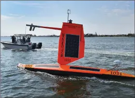  ??  ?? The drones will work in tandem with underwater “gliders” that the National Oceanic and Atmospheri­c Administra­tion uses to track water conditions as deep as 1,000 feet below the ocean’s surface.