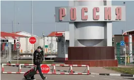  ?? Gleb Garanich/Reuters ?? The border crossing point in Hoptivka near Kharkiv, Ukraine on 18 March 2020. Photograph: