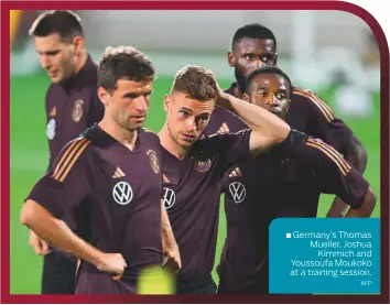  ?? AFP ?? Germany’s Thomas Mueller, Joshua Kimmich and Youssoufa Moukoko at a training session.