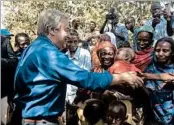  ?? JOEL KOUAM/AP ?? U.N. Secretary-General Antonia Guterres visits people at a cathedral in Bangassou, Central African Republic.