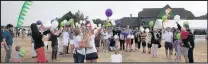  ??  ?? More than 1,500 people descended on Loughborou­gh Grammar School Playing Fields for Robbie’s Rugby Festival.