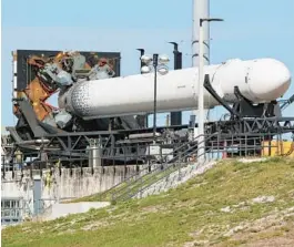  ?? RICARDO RAMIREZ BUXEDA/ORLANDO SENTINEL ?? A Terran 1 rocket built by Relativity Space sits on its side at Launch Complex 16 at Cape Canaveral Space Force Station on Dec. 6.