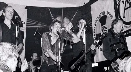  ??  ?? CRASS PERFORM AT ST PHILLIPS COMMUNITY CENTRE IN SWANSEA, WALES ON SEPTEMBER 24, 1981. PENNY RIMBAUD IS ON THE DRUMS.