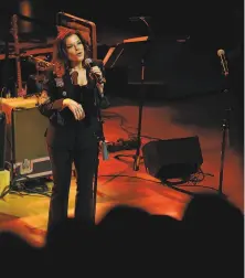  ??  ?? Rosanne Cash performs “A Feather’s Not a Bird.” She also spoke about Staples’ dedication to her craft and to civil rights.