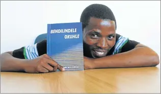 ?? Picture: SIKHO NTSHOBANE ?? RAISING THE BAR: Ngqeleni-born Simbongile Mvundlela, 31, who works as a car guard in one of the largest shopping malls in Mthatha, has penned his first book called ‘Bendilinde­le Okuhle’