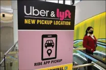  ?? STEVEN SENNE / AP ?? Uber and Lyft have teamed up to create a database of drivers ousted from their services for complaints of sexual assault and other crimes that raised passenger-safety concerns for years.