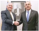  ?? — Reuters ?? Turkish Foreign Minister Mevlut Cavusoglu with US Secretary of State Rex Tillerson in Ankara on Friday.