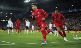  ?? ?? Roberto Firmino celebrates scoring Liverpool's third goal. Photograph: Jon Super/AP