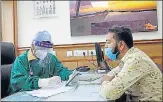  ?? ANI ?? A patient consults a doctor at the out-patient department of n
Sir Ganga Ram Hospital in New Delhi.