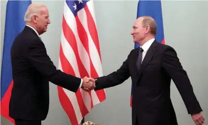  ??  ?? Joe Biden, then the US vice-president, shakes hands with Vladimir Putin, then Russia’s prime minister, in Moscow in 2011. Photograph: Maxim Shipenkov/EPA