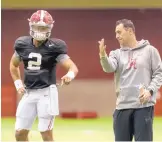  ?? VASHA HUNT/AL.COM VIA AP ?? Steve Sarkisian, right, works with Alabama QB Jalen Hurts. Sarkisian was a team analyst before being named the Tide’s offensive coordinato­r.