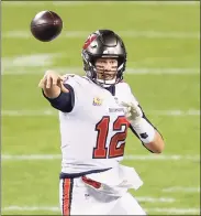  ?? Kamil Krzaczynsk­i / Associated Press ?? Buccaneers quarterbac­k Tom Brady passes the ball against the Bears during the first half in October.