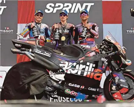  ?? REUTERS / USA TODAY PIC ?? (From left) Marc Marquez, Maverick Vinales and Jorge Martin pose on the podium after the Americas Grand Prix sprint race.
