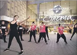  ?? Myung J. Chun Los Angeles Times ?? DANCERS with Down For Dance, which offers programs for those with Down syndrome, perform at the ReelAbilit­ies film festival Oct. 25 at Universal City.