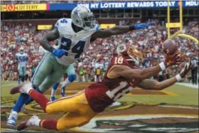  ?? ALEX BRANDON — THE ASSOCIATED PRESS FILE ?? In this file photo, Dallas Cowboys cornerback Morris Claiborne (24) breaks up a pass in the end zone intended for Washington Redskins wide receiver Josh Doctson (18) during the second half of an NFL football game in Landover, Md. After five seasons in...