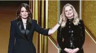  ?? NBCUnivers­al / AFP via Getty Images ?? Tina Fey, left, and Amy Poehler host the ceremony from New York and Los Angeles, respective­ly.