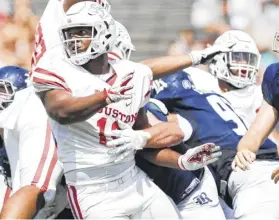  ?? Elizabeth Conley / Staff photograph­er ?? Enjoy college teams close to home — say, the University of Houston Cougars, above, or the Roadrunner­s from the University of Texas at San Antonio.