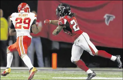  ?? JOHN BAZEMORE / ASSOCIATED PRESS ?? Chiefs safety Eric Berry ruined Matt Ryan’s day Sunday, returning one intercepti­on for a touchdown and another for Kansas City’s winning points on a failed 2-point conversion.