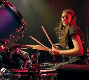  ??  ?? 15-year-old Amy Claire says she was so nervous she nearly blacked out on stage with The Killers – but seriously impressed with her drumming.