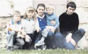  ??  ?? Colin on his mum Rosemary’s lap along with brothers Stephen and Philip and sister Alison