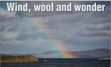  ?? The New York Times/ANDY HASLAM ?? A rainbow cuts across the sky over the Shetland Islands off the coast of mainland Scotland. The rugged, isolated, moody nature of the islands creates a unique atmosphere for tourists.