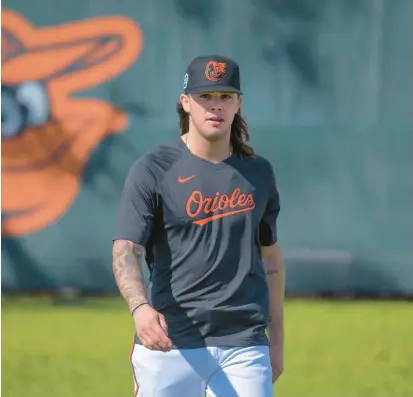  ?? KARL MERTON FERRON/BALTIMORE SUN PHOTOS ?? After pitching effectivel­y as a reliever at the end of last season, left-hander DL Hall is aiming to crack the Orioles’ starting rotation. He is motivated by doubters.