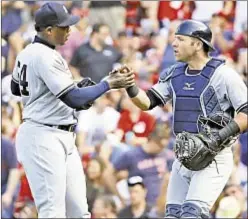  ?? USA TODAY SPORTS ?? Aroldis Chapman celebrates with Austin Romine after Yanks win Game 1 of Sunday’s doublehead­er in Boston.