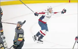  ?? ROSS D. FRANKLIN – THE ASSOCIATED PRESS ?? Washington’s Lars Eller, right, celebrates after scoring the winning goal in the third period of Game 5of the Stanley Cup Finals on Thursday.