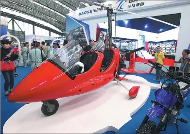  ?? ZHAO ZHAO / FOR CHINA DAILY ?? A rotorcraft made by Baoti Group at an exhibition in Baoji, Shaanxi province. The central government has put forward a series of policies to promote civil-military integratio­n in recent years.