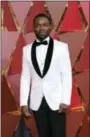  ?? PHOTO BY RICHARD SHOTWELL — INVISION — AP ?? David Oyelowo arrives at the Oscars on Sunday at the Dolby Theatre in Los Angeles.